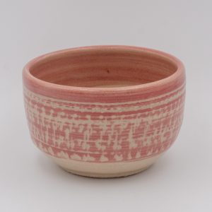 Ruby coloured stoneware bow with chattering texture